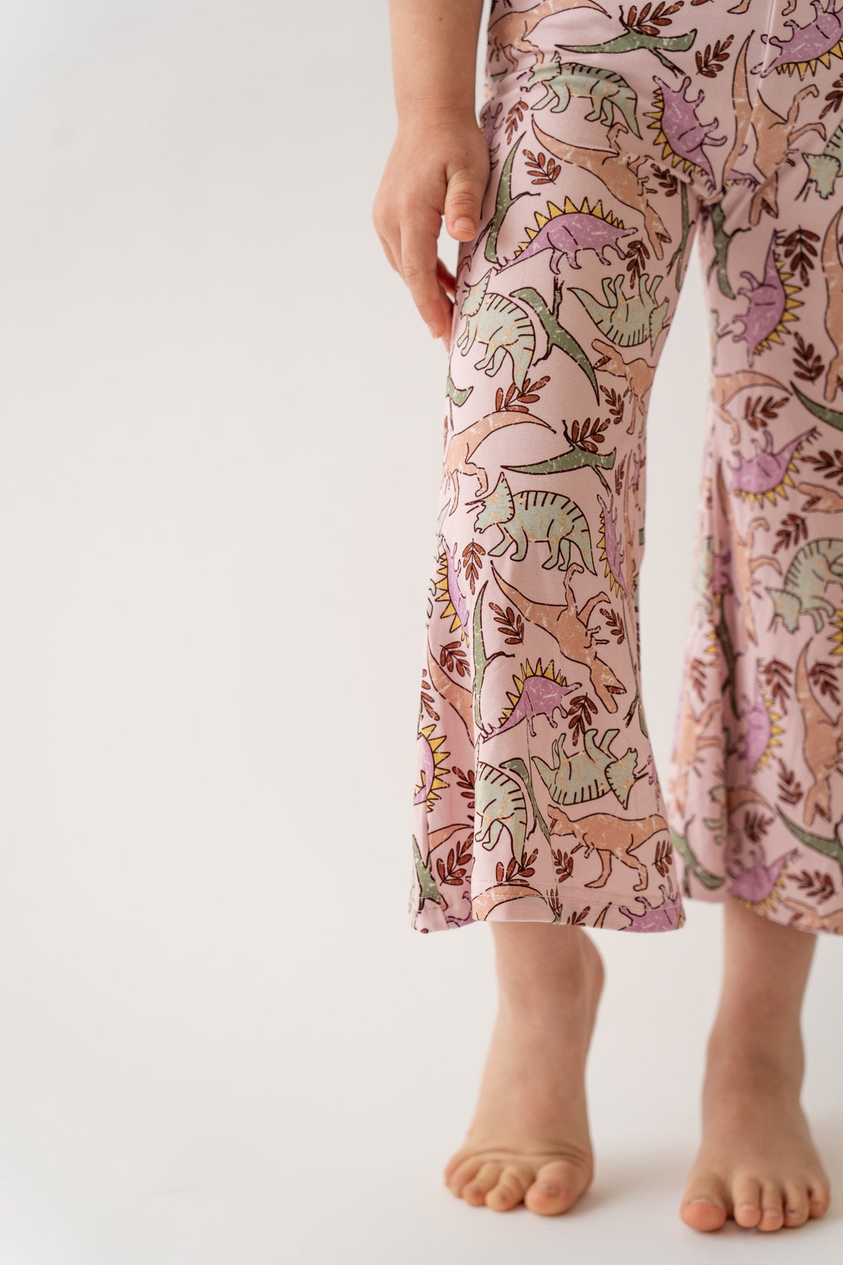 Girl's Pink Dinosaur Print Bamboo & Viscose Tie Straps Bell Romper