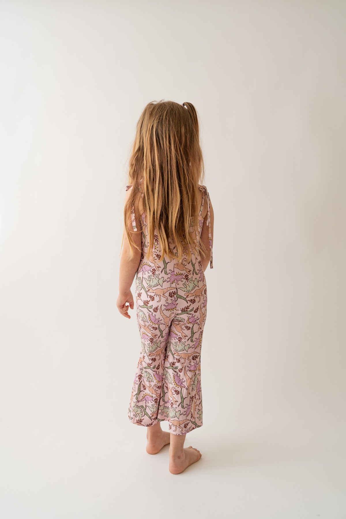 Girl's Pink Dinosaur Print Bamboo & Viscose Tie Straps Bell Romper